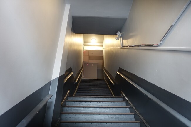 Wooden Stairway to first floor Apartments - 5 E Broad St