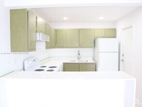 Building Photo - 1220 71st St