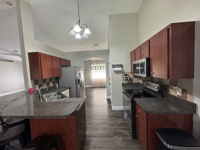 Building Photo - Gorgeous and Beautifully Maintained 3/2 Home on Close to an Acre