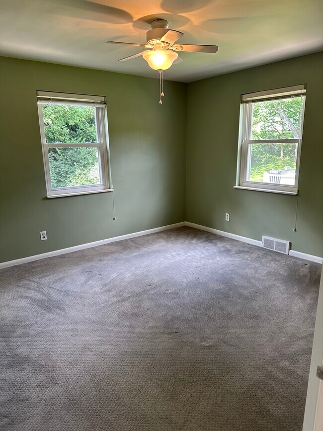 Both bedrooms have ceiling fans. - 20 Holly Ln