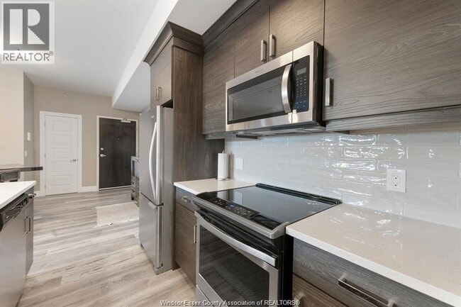 Photo du bâtiment - 5850 Newman Blvd