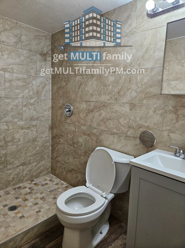 Building Photo - Tranquil Security: Gated 1 Bedroom, 1 Bath...