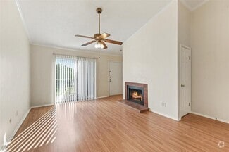 Building Photo - 7144 N Holiday Dr