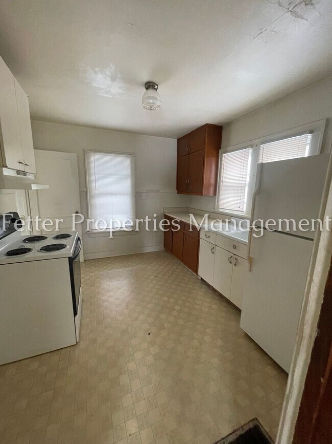 Building Photo - First Month's Rent Half Price!