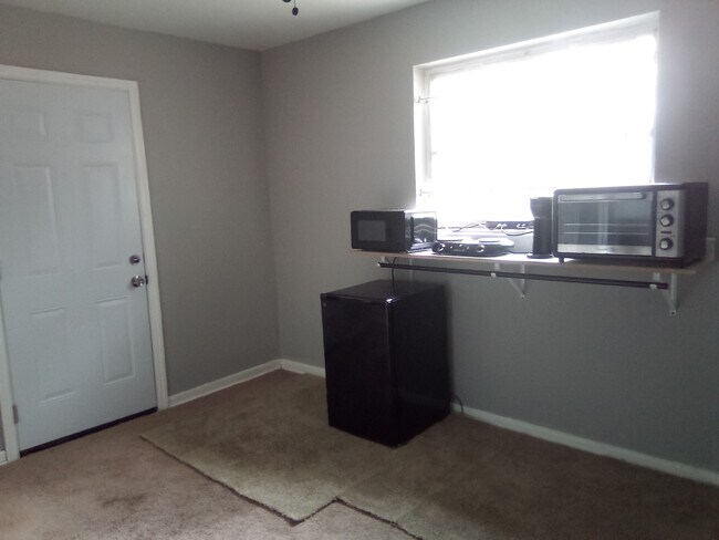 Kitchenette. This is a sitting room/ kitchenette - 5040 Tallyho Ave