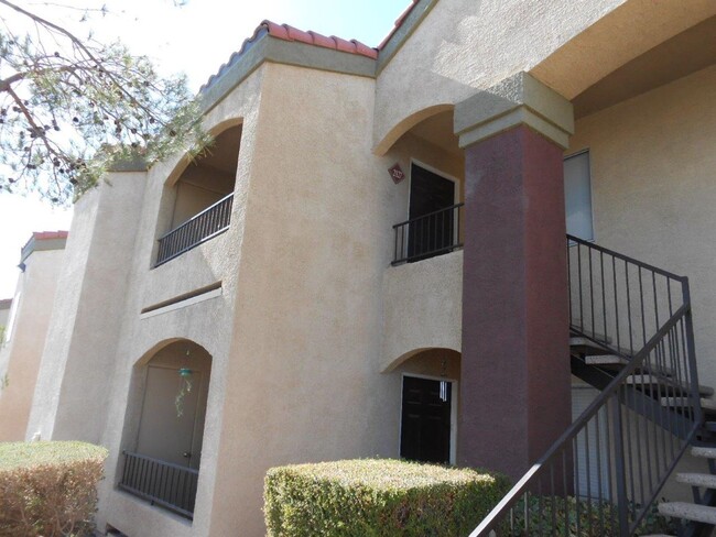 Building Photo - Newly remodeled 2nd story condo in Gated c...