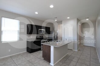 Building Photo - 37710 W Amalfi Ave