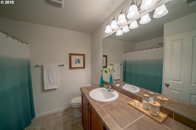 Upstairs Master bathroom - 635 NW 118th Ave