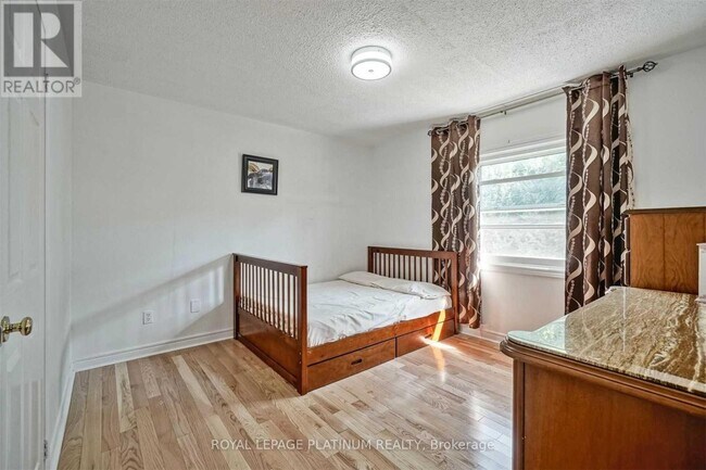 Building Photo - 47 Quail Feather Crescent