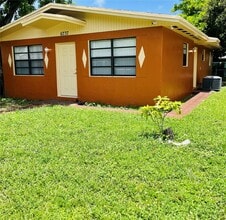 Building Photo - 6737 NW 6th Ct
