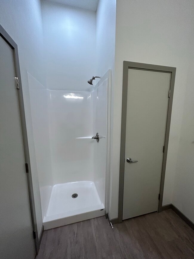 Shower/Linen Closet - Block 100 Apartments