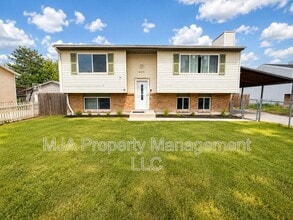 Building Photo - 6375 Fuchsia Dr