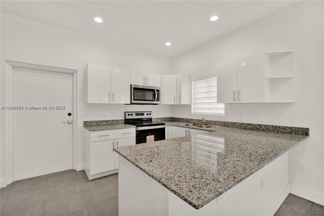 Building Photo - 6321 NW 1st Pl