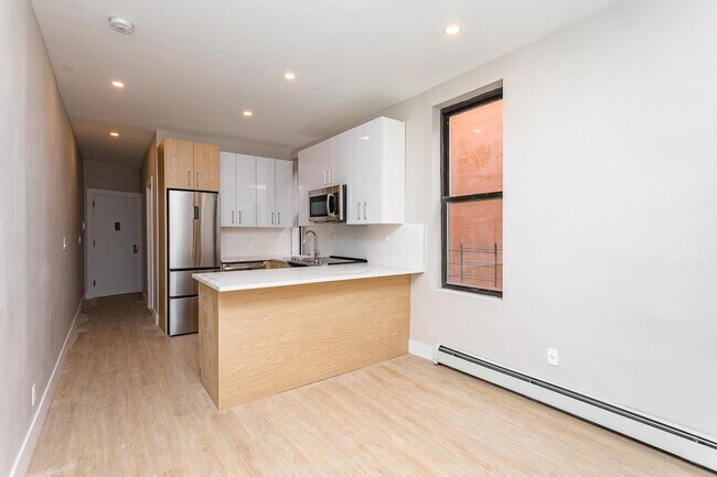 Building Photo - 319 Malcolm X Blvd