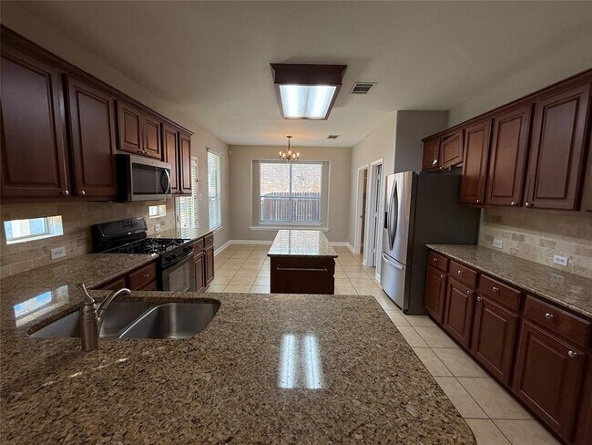 Foto del edificio - 3721 Gentle Winds Ln