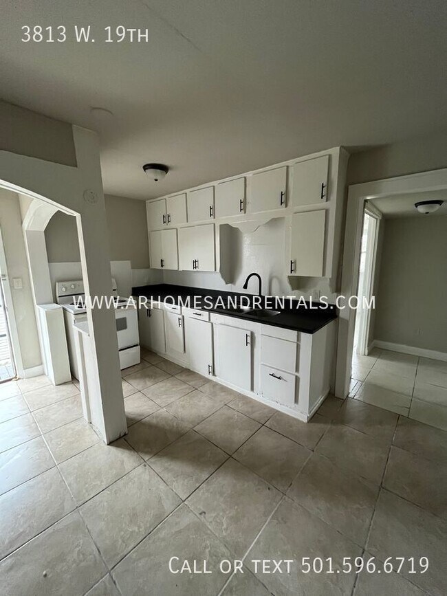 Building Photo - 3813 W. 19th | $895 | 4 beds, 1.5 bath