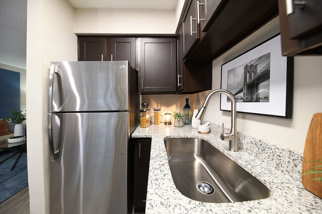 Experience modern elegance with this stylish kitchen design. - Element at Cedar Bluff