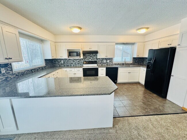 Building Photo - Single Family Home with 4-Bedrooms and 2 bathrooms in Coon Rapids