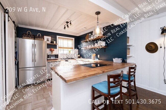 Building Photo - 209 W G Ave