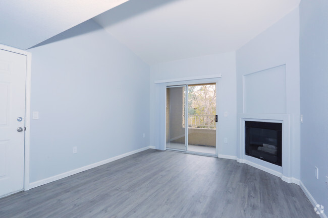 1BR, 1BA - 708 SF Renovated Living Room - Flamingo Chateau