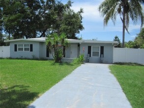 Building Photo - 7374 Royal Palm Dr