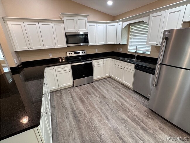 Building Photo - 7779 N Triana Dr