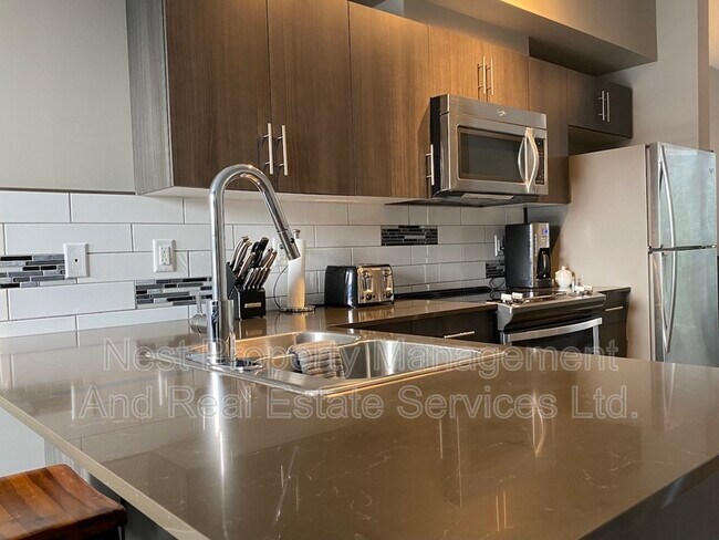 Photo du bâtiment - 110 Baxter Ave