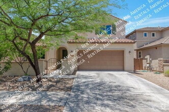 Building Photo - 5768 S Tiger Lily Pl