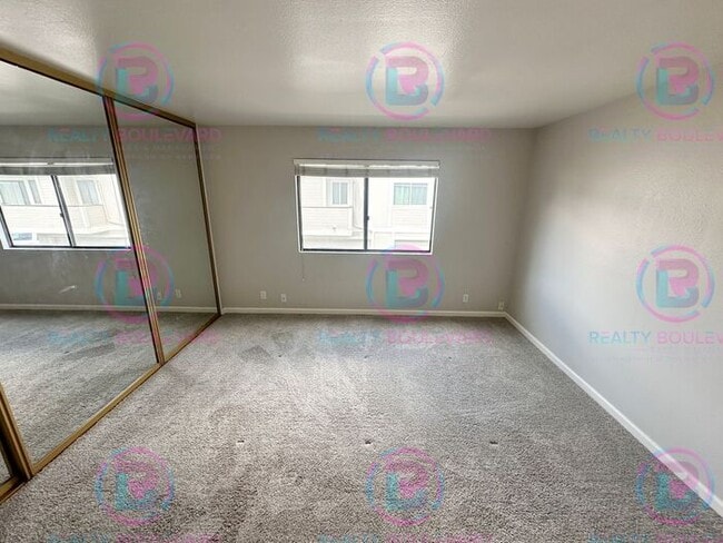Building Photo - Contemporary 2-Bed Condo with Garage & Poo...