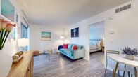 Located at 693 Wymore Road in Altamonte Springs, FL, this one-bedroom, one-bathroom unit offers a well-organized single-floor layout that maximizes every inch of its compact footprint. The combined living and dining area forms the heart of the home, featuring wood-look flooring, neutral white walls, and a textured ceiling that runs throughout the space. The living area is bright and open, with natural light filtering in from a nearby balcony — a private outdoor retreat ideal for relaxing. The kitchen is thoughtfully appointed with white shaker-style cabinetry, dark granite countertops, a mosaic tile backsplash, and a full suite of stainless steel appliances including a range, microwave, dishwasher, and refrigerator. The bedroom offers a comfortable, private space with a window that brings in natural light and a view of the surrounding greenery. Three closets distributed throughout the unit provide generous storage. The bathroom includes a full tub-shower combination with clean white tile surround and wood-look flooring consistent with the rest of the home. An in-unit laundry area adds everyday convenience. With three closets and a practical layout, this Altamonte Springs unit delivers functional living in a well-maintained residential setting.