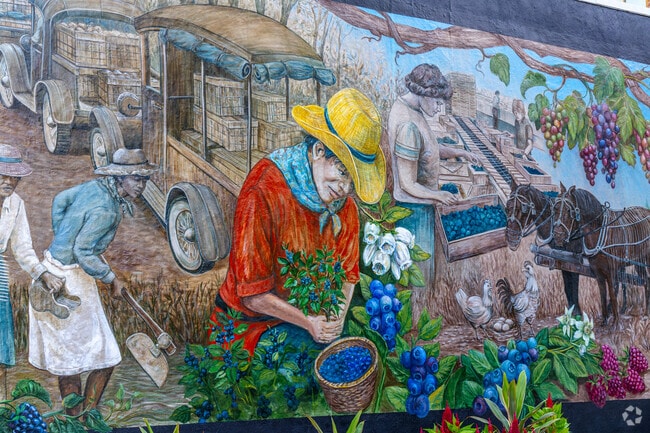 A mural celebrates the area's history of blueberry farms.