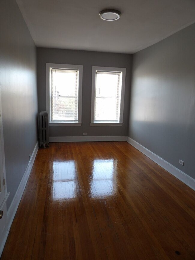 Building Photo - 7947 S Langley Ave