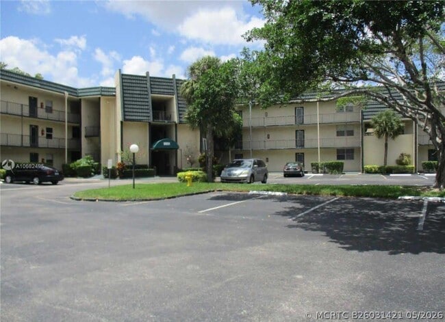 Building Photo - 9091 Lime Bay Blvd
