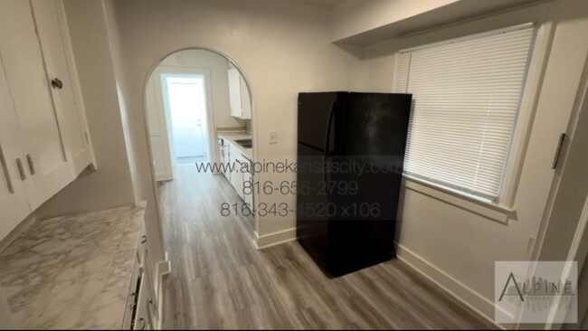 Building Photo - Updated Midtown Home AT Blue Hills Park! Corner Lot, Garage & Carport!