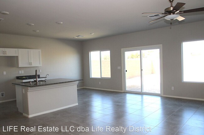 Building Photo - 4 br, 3 bath House - 8255 Selenite St.
