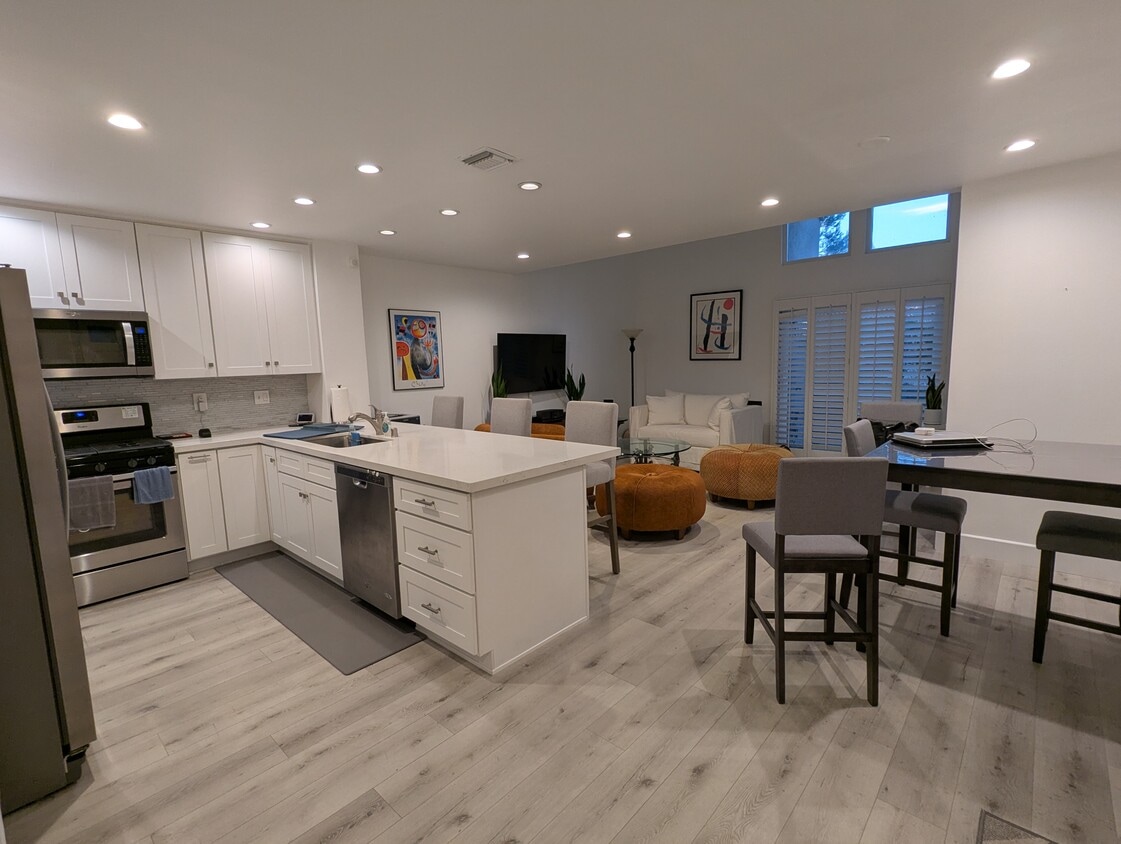 kitchen, dining, living areas - 20 Corsica Dr