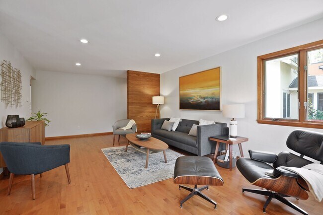 Alternate view of living room with view toward entryway and hallway to bedrooms - 2017 Thomas Ave S