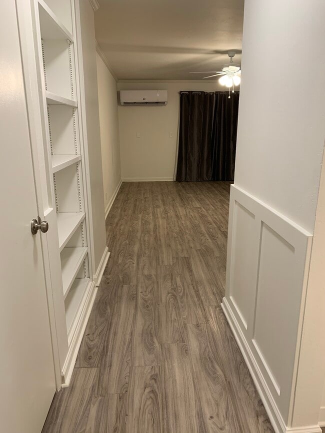 Entry with built in bookcase - 342 E Saint Charles St