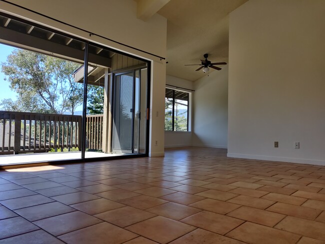 Living room, balcony and dining room - 3392 Brittan Ave