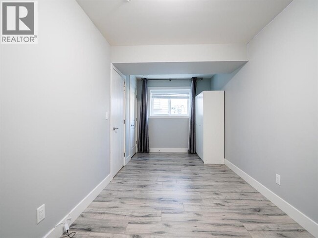 Building Photo - 24302-2101A 101a Ave