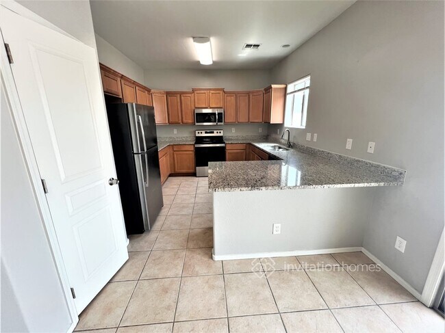 Building Photo - 10955 W Griswold Rd