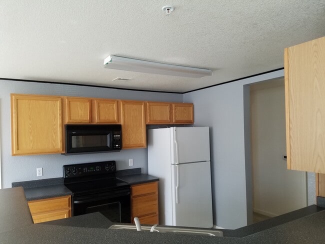 Photo - 7440 S Blackhawk St Apartment