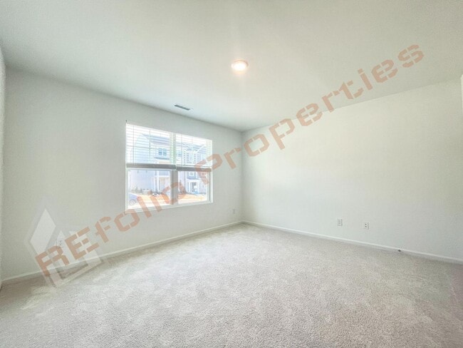 Building Photo - Brand New 3 Story, 4 bedroom, 3.5 bathroom Townhome Featuring a 1st floor Guest Suite, 2 Car Gara...