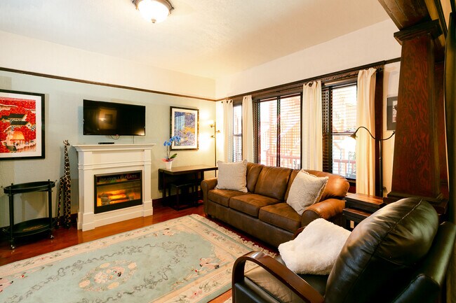 living room with electric fireplace - 747 Tenth Ave
