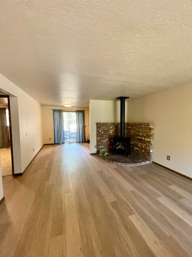 Building Photo - New paint and flooring in this great duple...