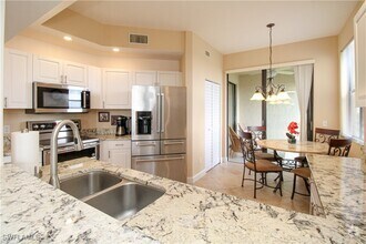 Building Photo - 7024 Pelican Bay Blvd