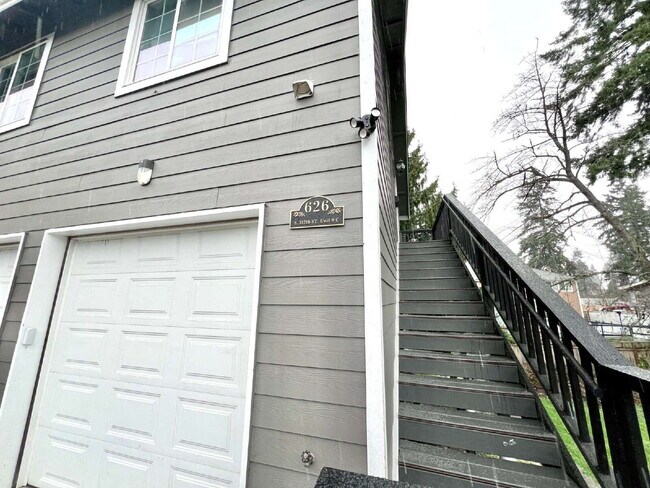 Building Photo - Elevated 3-Bedroom Home with Secure Garage & Cozy Living Space