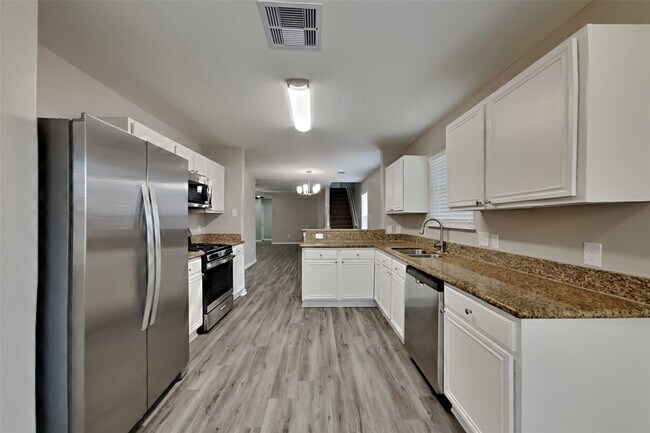 Foto del edificio - 6746 Windy River Ln