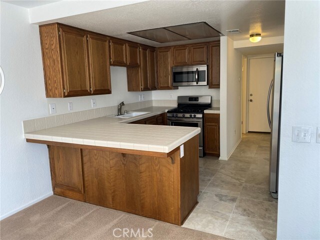 Building Photo - 5050 Canyon Crest Dr