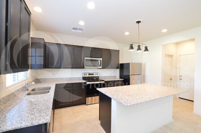 Building Photo - 24588 W Flores Dr